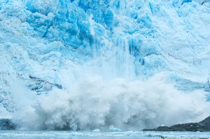 Hubbard Gacier calving chunks of ice into Russell Fjord, Wrangell-St. Elias National Park and Preserve, Alaska.