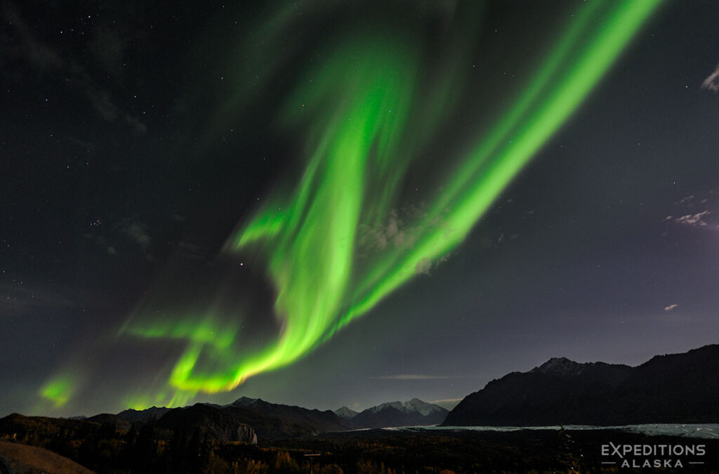 Active display of the northern lights over the Chugach Mountains, near the Matanuska Glacier, Alaska.