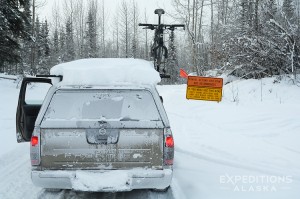 Winter travel, a snow-laden pickup truck on the McCarthy Road, Wrangell-St. Elias National Park and Preserve, Alaska.Winter travel, a snow-laden pickup truck on the McCarthy Road, Wrangell-St. Elias National Park and Preserve, Alaska. Please click on the image above to view a larger version of this photo.