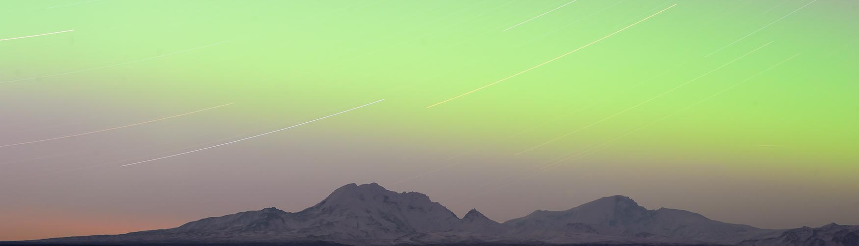 Wrangell Mountains and Alaska star trails and northern lights photo Wrangell-St. Elias National Park, Alaska.
