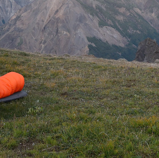 Backpacker with Mountain Hardwear Skyledge 2 tent, Wrangell St. Elias National Park, Alaska.