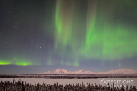 The northern lights fill the sky over the Wrangel Mountains and Wrangell - St. Elias National Park and Preserve, Alaska.