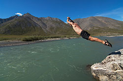 Swimming on Marsh Fork, Canning River Rafting trip, ANWR, Alaska.