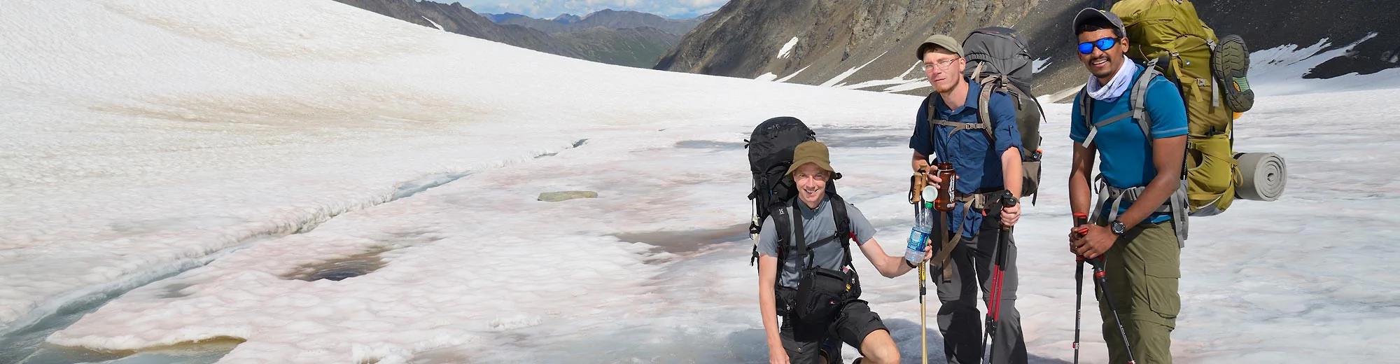 Alaska backpacking trips Backpackers on snow covered glacier, Southern Traverse route, Wrangell-St. Elias National Park, Alaska.