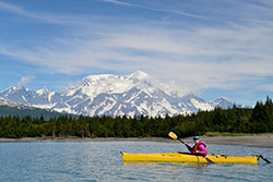 Great sea kayaking locations in Alaska Woman sea kayaking in Icy Bay, Wrangell-St. Elias National Park, Alaska.