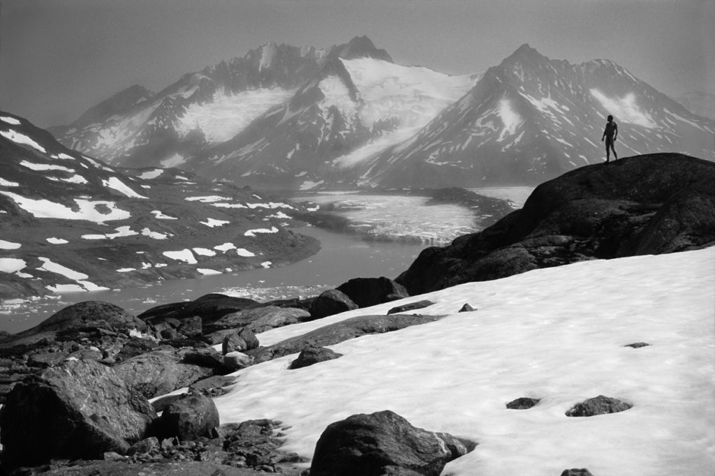 Naked hiker in the mountains.