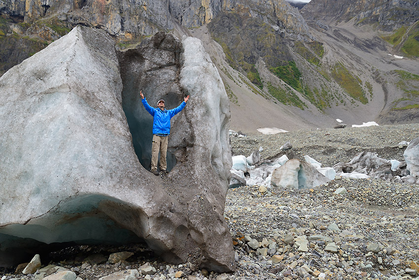 Hiker on landed glacier, hidden Creek, Wrangell-St. Elias National Park, Alaska.