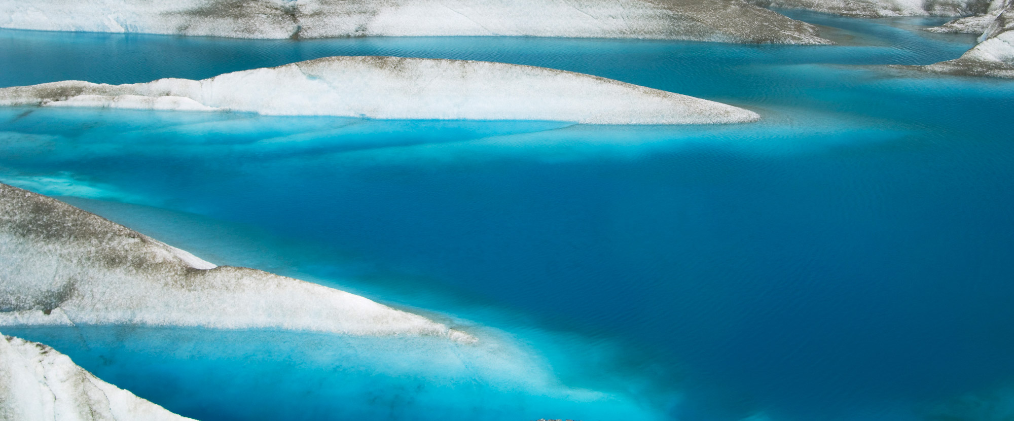 Glacial Tarn on Tana Glacier, Wrangell-St. Elias National Park, Alaska.