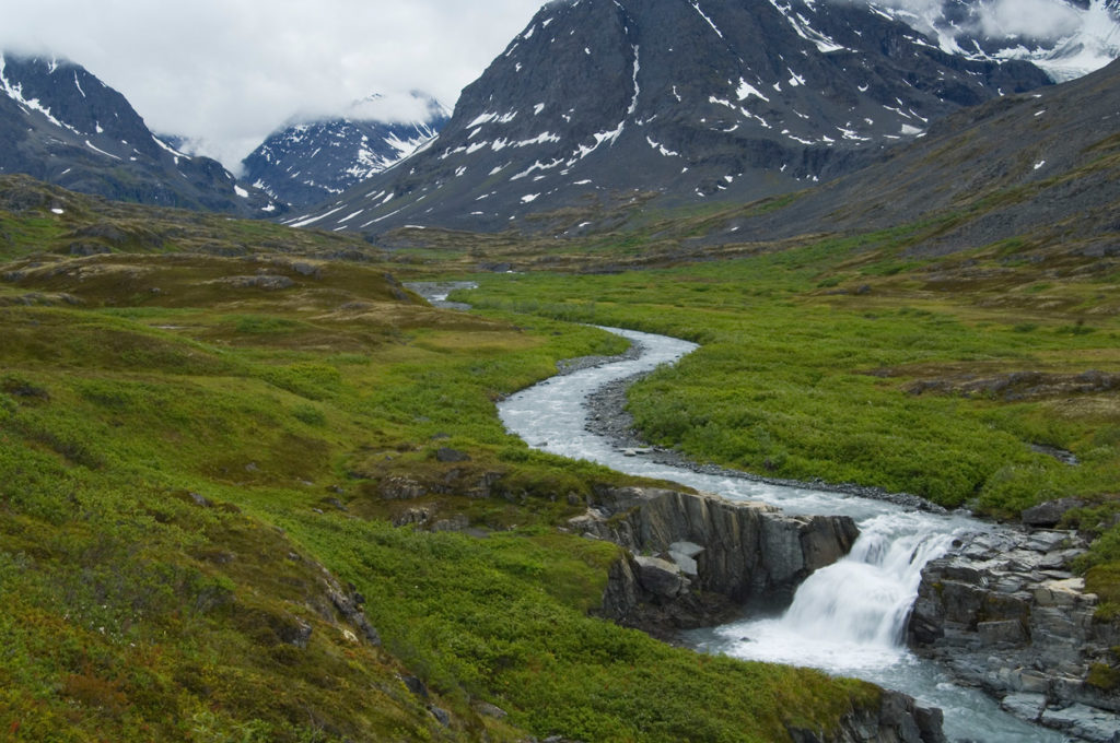 East fork of Little Bremner River waterfall hiking trip Wrangell-St. Elias National Park, Alaska.