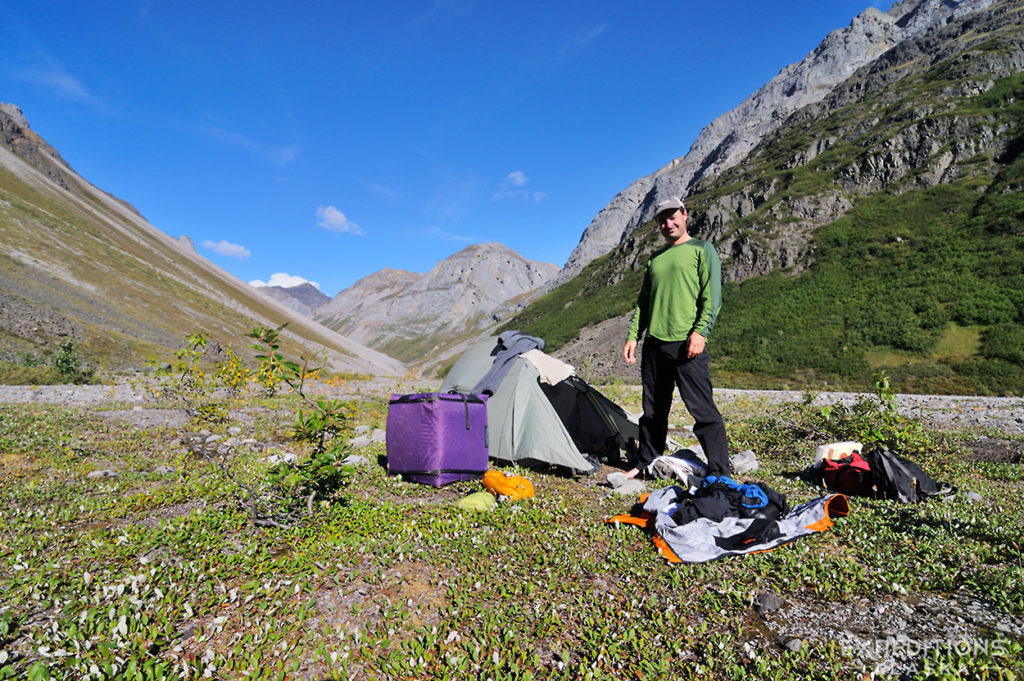 Packing up camp whilst backpacking Hidden Creek, Wrangell - St. Elias National Park, Alaska.