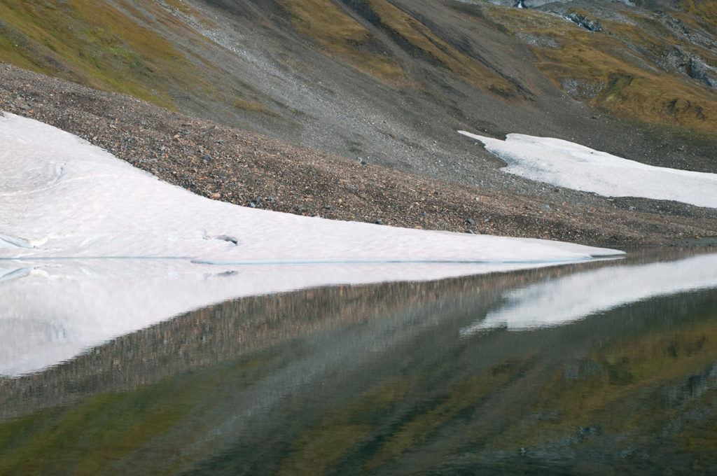 Alpine tarn in the pass above Hidden Creek, Wrangell-St. Elias National Park, Alaska.