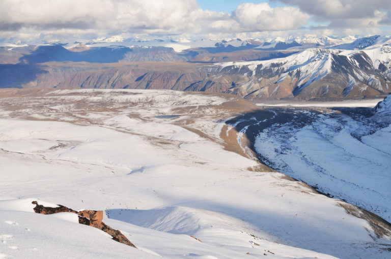 Landscape view of Wrangell Mountains on Jarvis Plateau backpacking trip Wrangell-St. Elias National Park, Alaska.