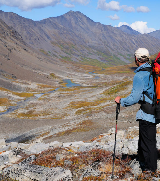 Alaska backpacking trips Seven Pass Backpacking trip, hiker in Chugach Mountains, Wrangell-St. Elias National Park, Alaska.