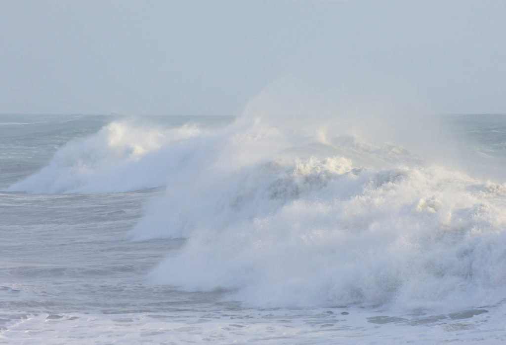 Pacific Coast waves on shoreline of Lost coast hiking trip Wrangell-St. Elias National Park, Alaska.