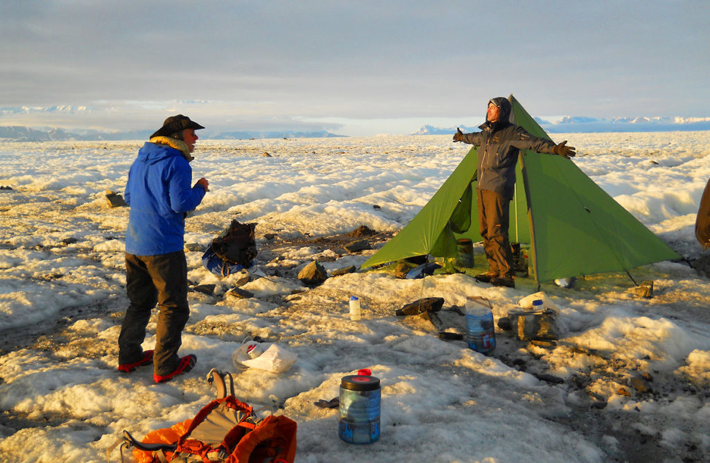 Backpacking trip Malaspina Glacier Cook tent and kitchen on Malaspina Glacier backpacking trek, Wrangell-St. Elias National Park, Alaska.