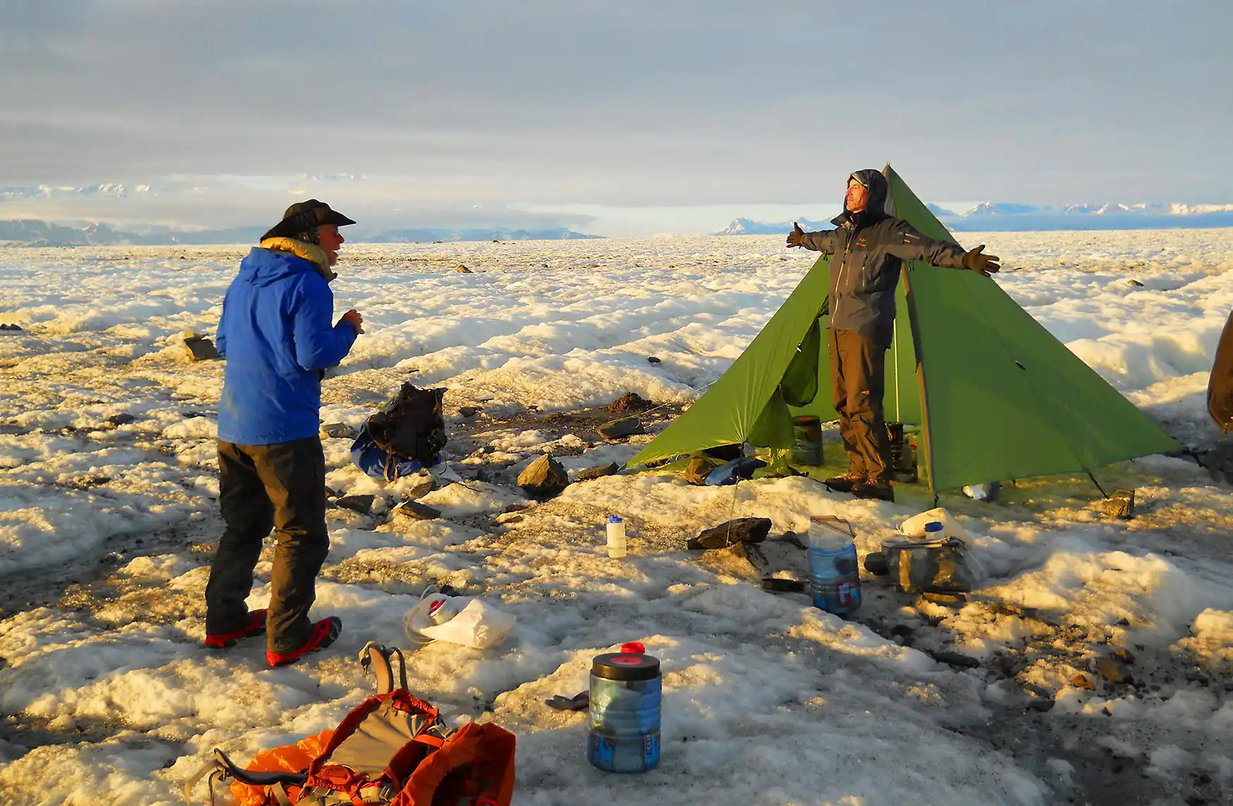 Backpacking trip Malaspina Glacier Cook tent and kitchen on Malaspina Glacier backpacking trek, Wrangell-St. Elias National Park, Alaska.