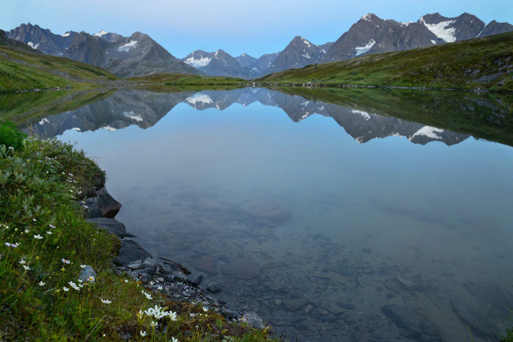 Bremner mines tuba lakes backpacking trip A lake a reflection of the Chugach Mountains between Bremner Mines and Tebay Lakes en route on the Southern Traverse backpacking trip. Wrangell-St. Elias National Park.