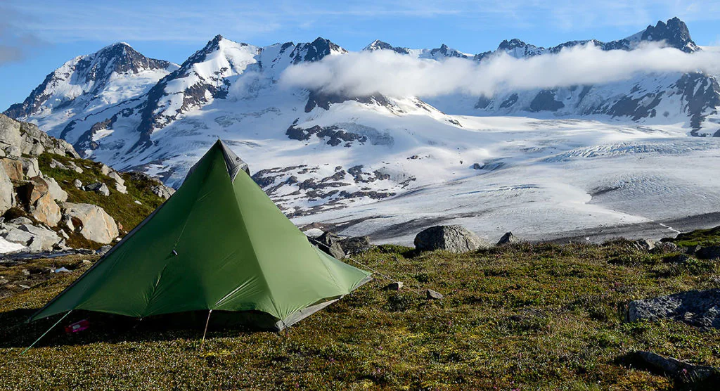 Chugach Mountains and campsite on Seven Pass Route backpacking trip, Wrangell-St. Elias National Park, Alaska.