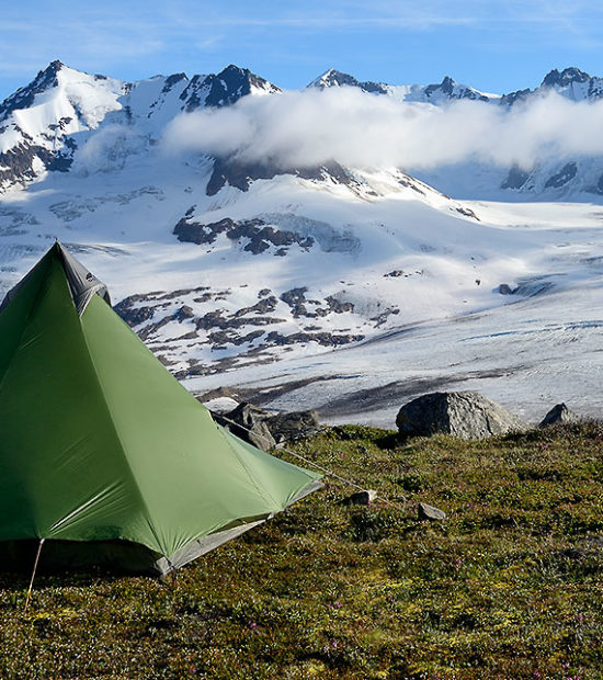 Chugach Mountains and campsite on Seven Pass Route backpacking trip, Wrangell-St. Elias National Park, Alaska.