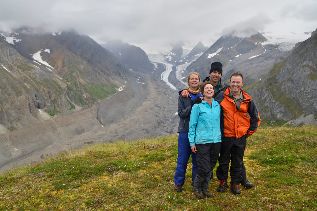 A group of hikers above Lakina River, Wrangell - St. Elias National Park, Alaska.