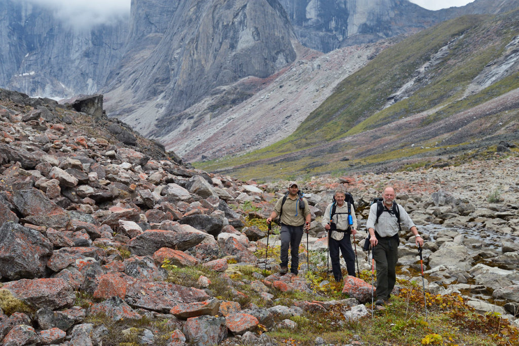 Arrigetch Peaks backpacking trip Backpackers coming down fro the high country Arrigetch Peaks backpacking trips, Gates of the Arctic, Alaska.