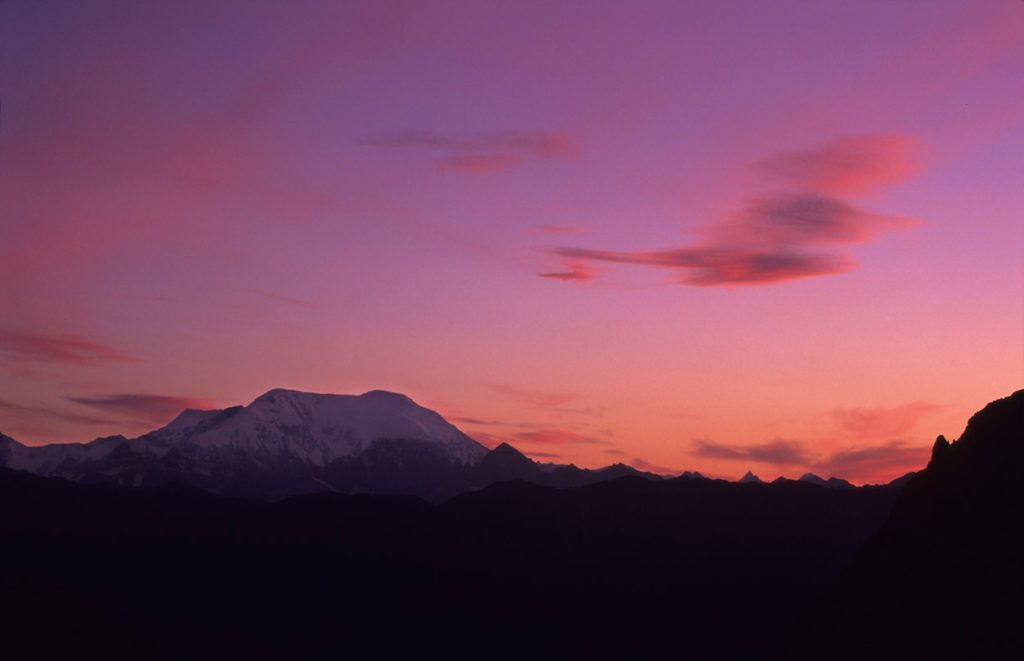 Steamboat Hills hiking trips sunset over Mt. Blackburn Wrangell-St. Elias National Park, Alaska.