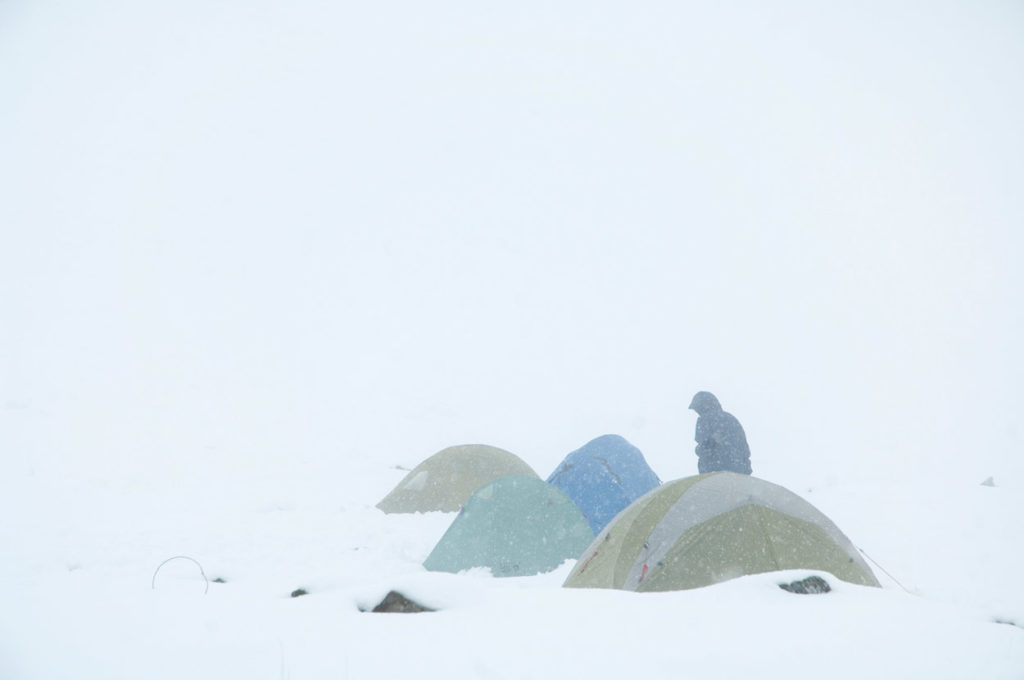 Snowed in camp on Chitistone Pass, Goat Trail backpacking trip, Wrangell-St. Elias National Park, Alaska.