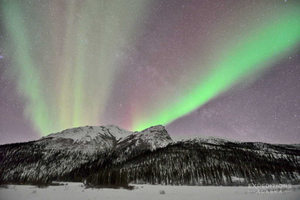 Colors of northern lights photos over Brooks Mountains Alaska.