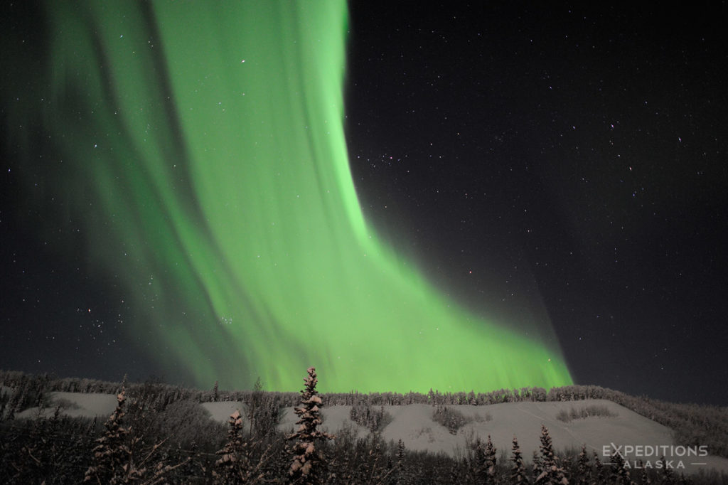 Northern lights photography tours Alaska winter.