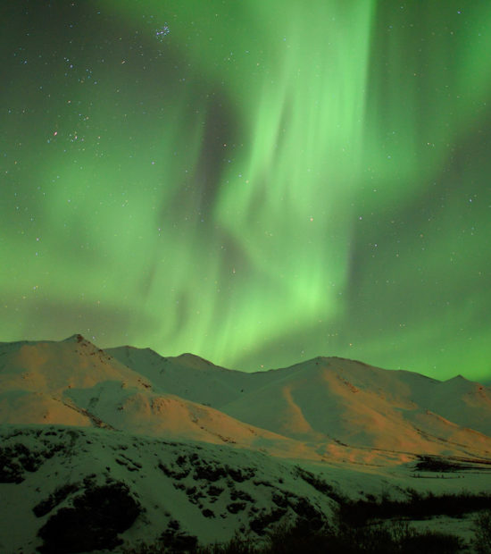 Photo of Northern Lights over Brooks Mountains, Alaska.