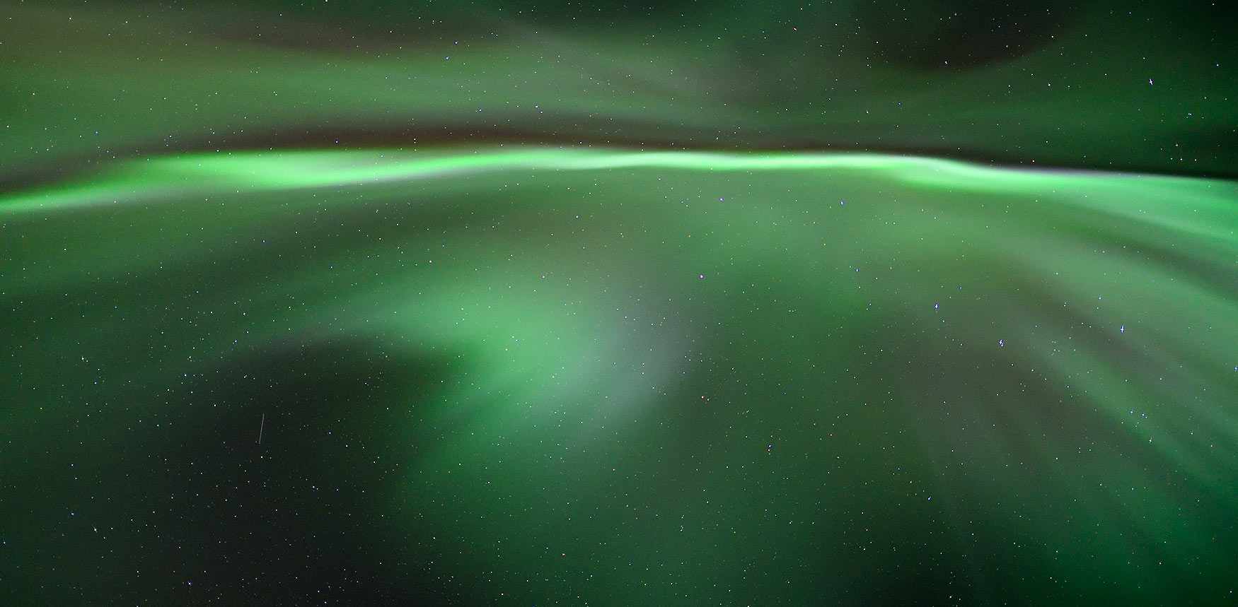 Aurora borealis over head, Alaska.