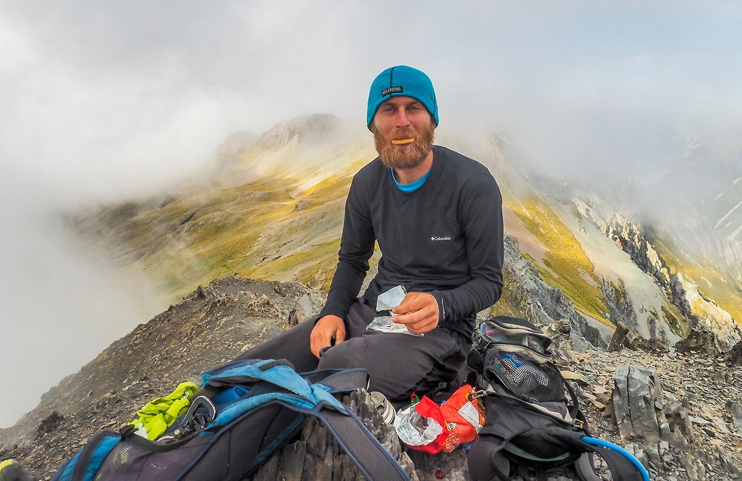 Alaska backpacking guide Rhane Pfeiffer at snack time.