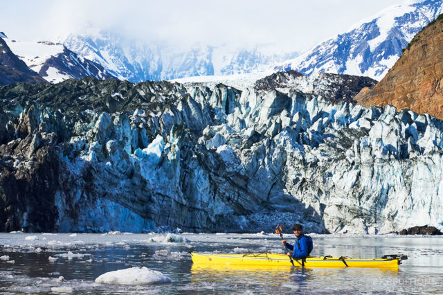 Guide Rhane Pfeiffer Kayaking near Tyndall Glacier, Tan Fjord, Icy Bay, Alaska.
