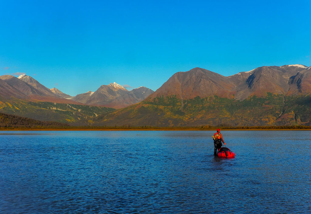 Packrafting west Fork Tana River Alaska.