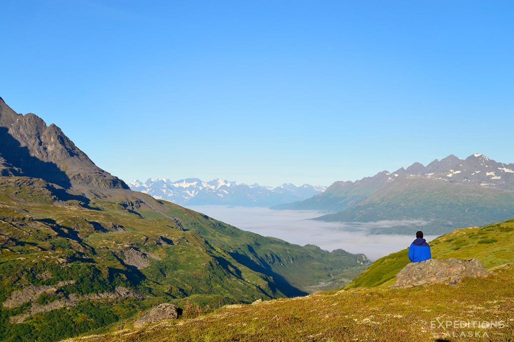 Backpacker in the Chugach Mountains, Bremner to Tebay backpacking trip, Wrangell-St. Elias National Park, Alaska.