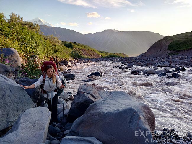 Hiking through the boulders by the Sanford River, Wrangell-St. Elias National Park, Alaska.