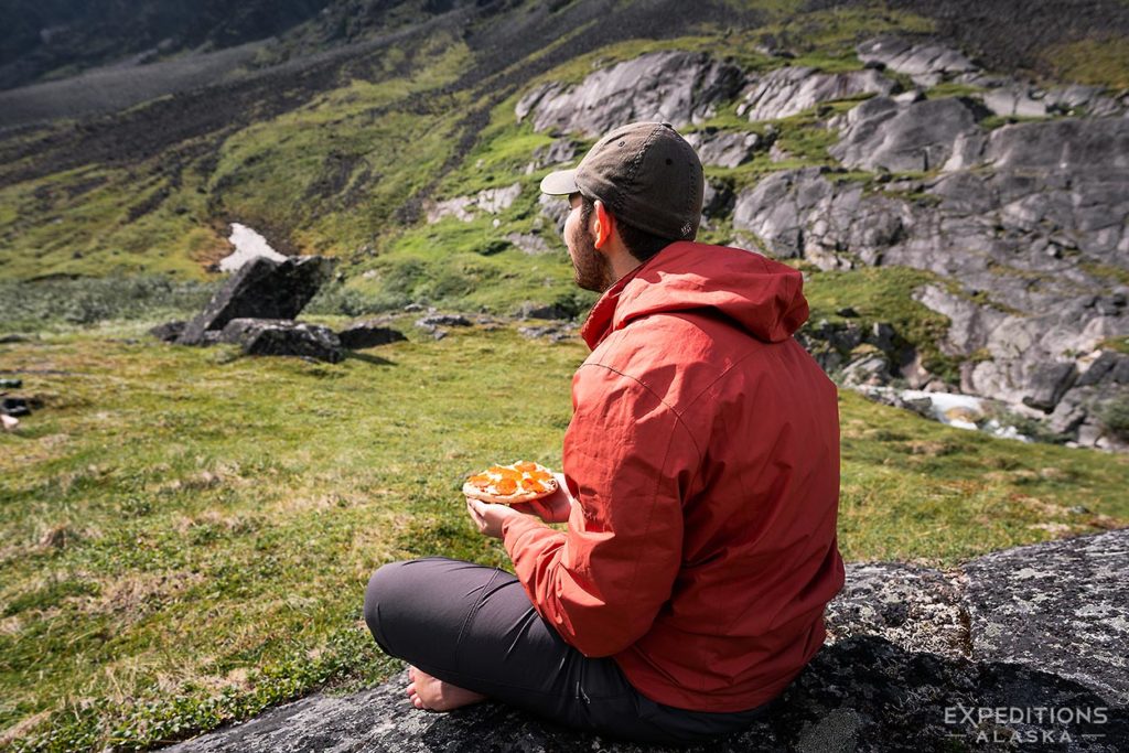 Resting for supper, Lake Clark Low Route Backpacking trip.