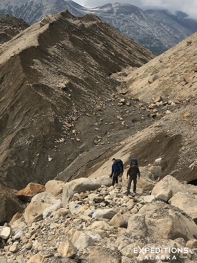 Backpacking over glacial moraines 7 Pass Route, Wrangell-St. Elias National Park, Alaska.