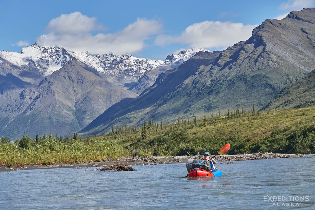 A paddler packrafting the Koyukuk River, Gates of the Arctic National Park.