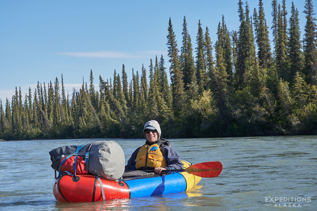 Alaska packrafter on Koyukuk River, Gates of the Arctic National Park.