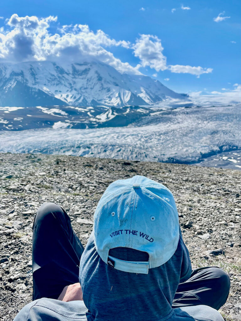 Expeditions Alaska guide contemplating mountains, Wrangell-St. Elias National Park