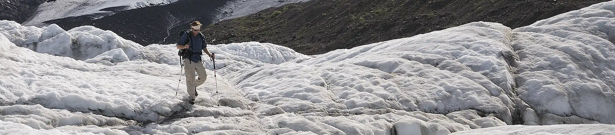 Person on a backpacking trip on Russell Glacier, Wrangell-St. Elias National Park, Alaska.