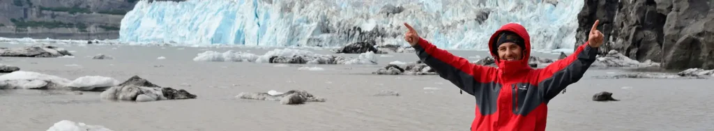 Alaska sea kayaking trips Kayaker near Yahtse Glacier, Icy Bay, Wrangell-St. Elias National Park, Alaska.