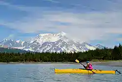 Great sea kayaking locations in Alaska Woman sea kayaking in Icy Bay, Wrangell-St. Elias National Park, Alaska.
