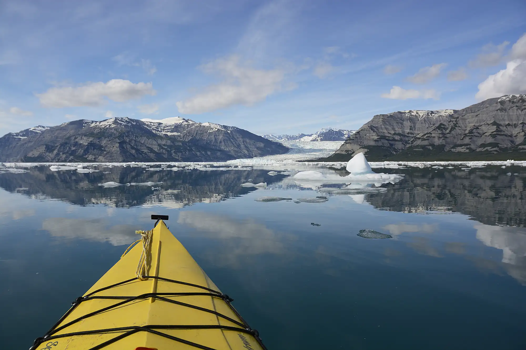 Sea kayaking locations in Alaska Glassy calm water, Icy Bay, Wrangell-St. Elias National Park, Alaska.