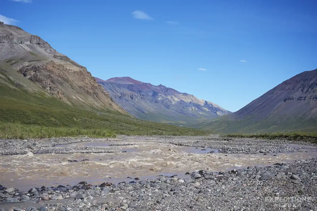 Headwaters of Jacksina River, a fast glacial river in Wrangell-St. Elias National Park difficult and dangerous for hikers to cross on backpacking trips.