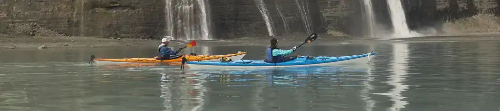 Sea kayaking trip past massive waterfalls, Icy Bay, Wrangell-St. Elias National Park