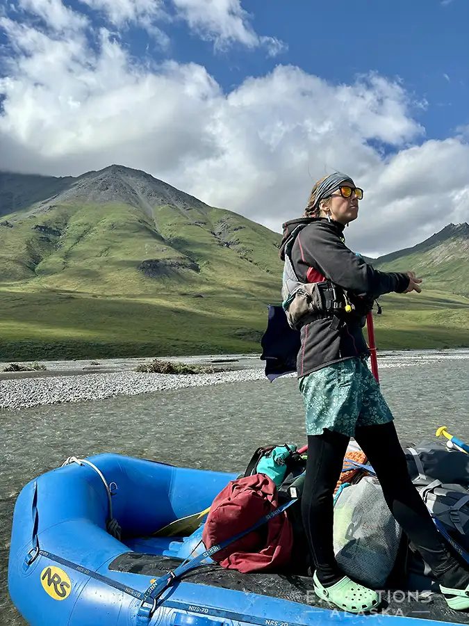 Expeditions Alaska rafting trip guide, Rachel Taylor, guiding a rafting tour on the Canning River, Arctic National Wildlife Refuge, Alaska.